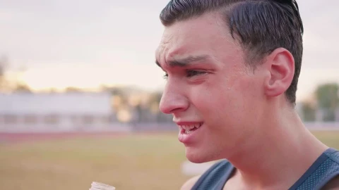 Stock Video Face Of An Exhausted Boy Drinking Water Outdoors Live Wallpaper For PC - Free Live Wallpaper