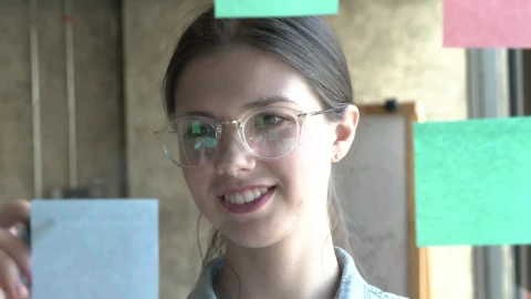 Stock Video Face Of A Woman Writing Ideas On Sticky Notes Live Wallpaper For PC - Free Live Wallpaper