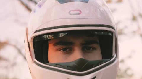 Stock Video Face Of A Motorcycle Rider With A Helmet Putting On Live Wallpaper For PC - Free Live Wallpaper