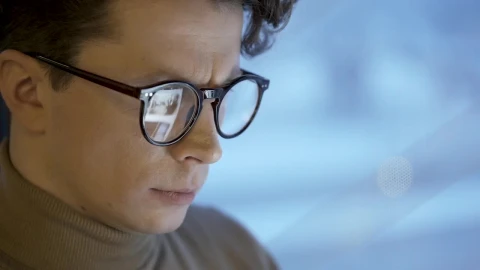 Stock Video Face Of A Man With Glasses Using A Tablet Live Wallpaper For PC - Free Live Wallpaper