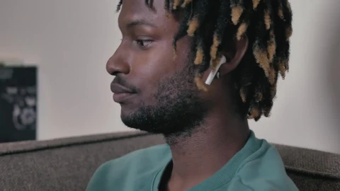 Stock Video Face Of A Man Listening To Music While Reading A Live Wallpaper For PC - Free Live Wallpaper