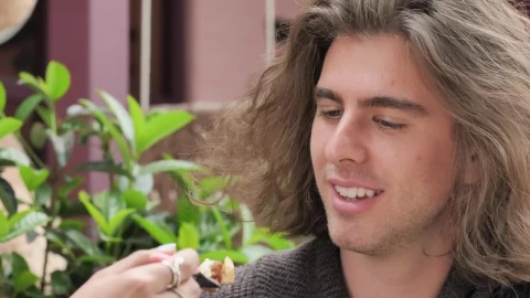Stock Video Face Of A Man Eating And Joking With His Girlfriend Live Wallpaper For PC - Free Live Wallpaper