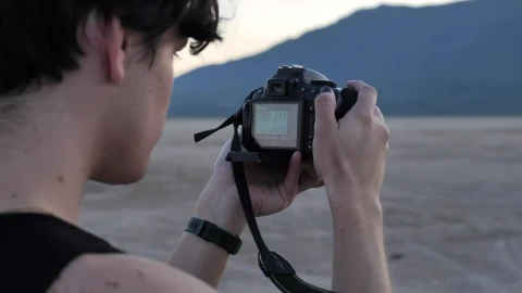 Stock Video Face Of A Boy Taking Pictures In A Desert Live Wallpaper For PC - Free Live Wallpaper