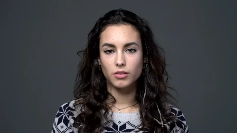 Stock Video Expressionless Woman Looking At The Camera Live Wallpaper For PC - Free Live Wallpaper