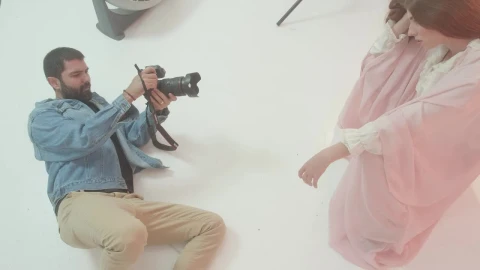 Stock Video Experienced Photographer Portraying A Girl On Set Live Wallpaper For PC - Free Live Wallpaper