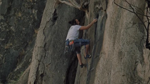 Stock Video Experienced Mountaineer Climbing A Rocky Mountain Live Wallpaper For PC - Free Live Wallpaper