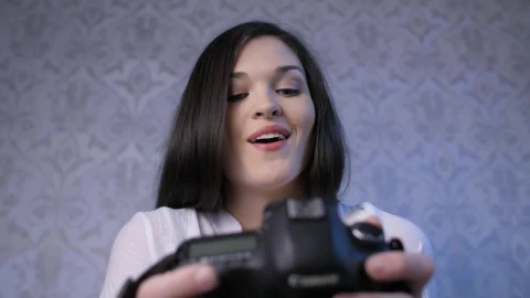 Stock Video Excited Woman Looking At Photos On Camera Live Wallpaper For PC - Free Live Wallpaper