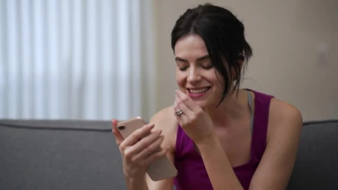 Stock Video Excited Girl Talking On Video Call With Her Cell Phone Live Wallpaper For PC - Free Live Wallpaper