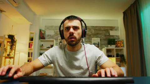 Stock Video Excited Gamer Playing In Their Room Live Wallpaper For PC - Free Live Wallpaper