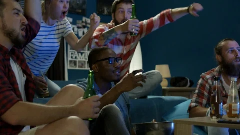 Stock Video Excited Friends Cheering At The Tv Live Wallpaper For PC - Free Live Wallpaper