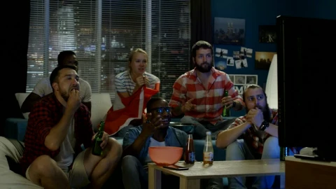 Stock Video Excited Friends Celebrating In Front Of The Tv Live Wallpaper For PC - Free Live Wallpaper