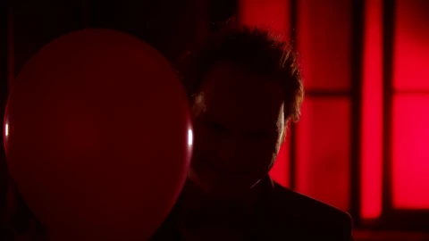 Stock Video Evil Clown Smiling Behing A Red Balloon Live Wallpaper For PC - Free Live Wallpaper