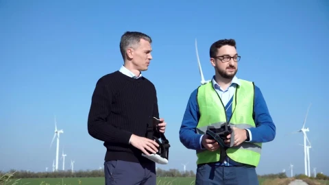 Stock Video Engineers Using Vr Headsets On Wind Farm Live Wallpaper For PC - Free Live Wallpaper