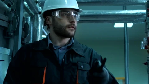 Stock Video Engineer Is Inspecting Pipes In The Lab Live Wallpaper For PC - Free Live Wallpaper