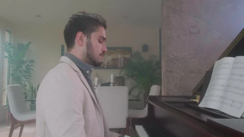 Stock Video Elegant Man Playing The Piano In A Luxurious Home Live Wallpaper For PC - Free Live Wallpaper