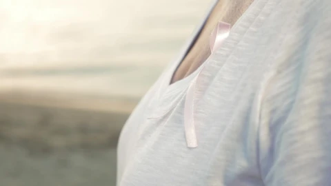 Stock Video Elderly Woman With A Pink Ribbon Live Wallpaper For PC - Free Live Wallpaper