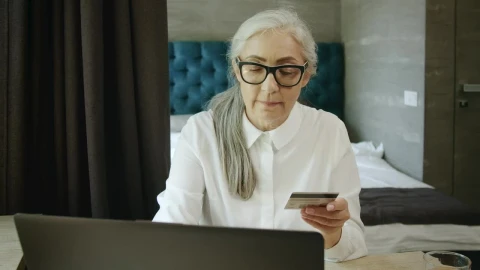 Stock Video Elderly Woman Online Shopping Uses Credit Card Payment Live Wallpaper For PC - Free Live Wallpaper