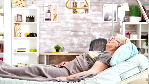 Stock Video Elderly Woman Laying On Bed In Nursing Home Live Wallpaper For PC - Free Live Wallpaper