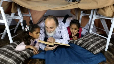 Stock Video Elderly Man Reading A Book To Children Live Wallpaper For PC - Free Live Wallpaper
