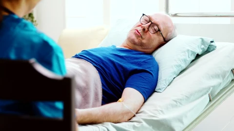 Stock Video Elderly Man Chats With Home Care Nurse While Laying In Live Wallpaper For PC - Free Live Wallpaper