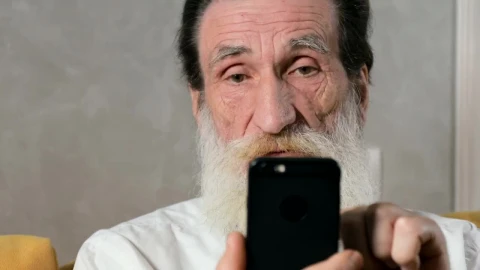 Stock Video Elderly Man Confused By Mobile App Live Wallpaper For PC - Free Live Wallpaper
