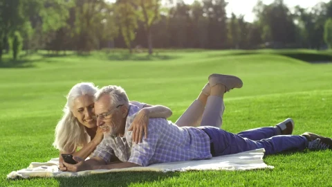 Stock Video Elderly Couple Using A Phone Outside Live Wallpaper For PC - Free Live Wallpaper