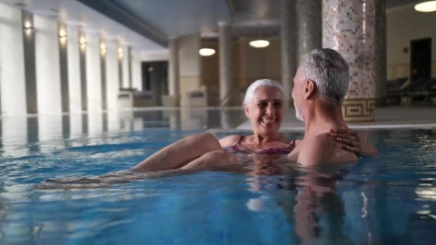 Stock Video Elderly Couple Enjoying Time In The Pool Live Wallpaper For PC - Free Live Wallpaper