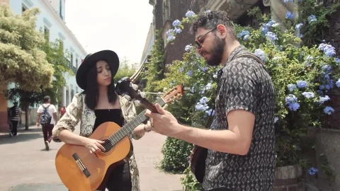 Stock Video Duo Playing Music Together On A Colonial Street Live Wallpaper For PC - Free Live Wallpaper