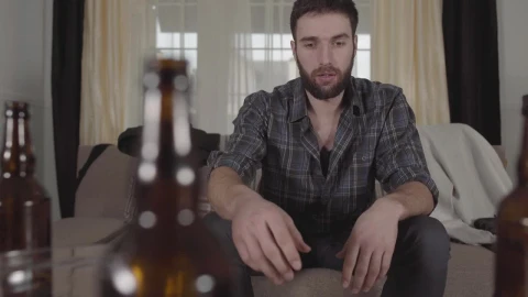 Stock Video Drunk Young Man Watching Television Live Wallpaper For PC - Free Live Wallpaper