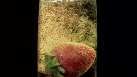 Stock Video Dropping A Strawberry In Champagne Live Wallpaper For PC - Free Live Wallpaper