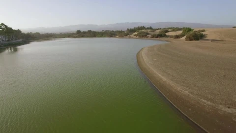 Stock Video Drone Heading Over A Green Lake Live Wallpaper For PC - Free Live Wallpaper