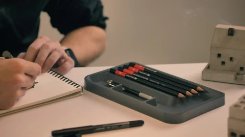 Stock Video Drawing In A Notebook On A White Table Live Wallpaper For PC - Free Live Wallpaper