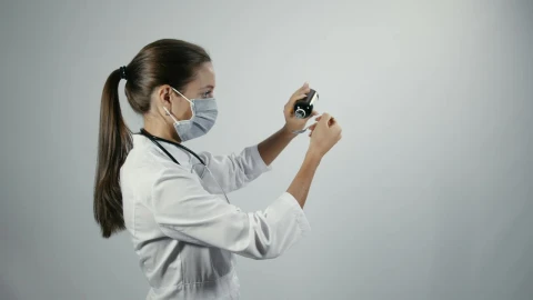 Stock Video Dr Dripping Medicine From A Bottle To A Spoon Live Wallpaper For PC - Free Live Wallpaper