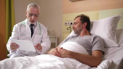 Stock Video Doctor With Mri Results And His Patient Live Wallpaper For PC - Free Live Wallpaper