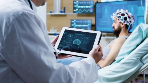 Stock Video Doctor Views D Brain Scan On Tablet In Modern Clinic Live Wallpaper For PC - Free Live Wallpaper