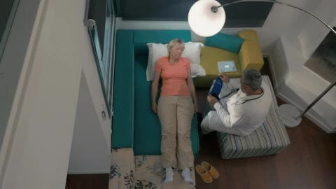Stock Video Doctor Visiting A Woman At Home Live Wallpaper For PC - Free Live Wallpaper