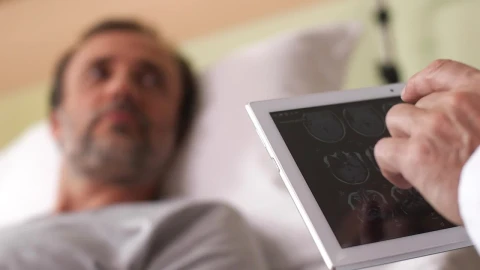 Stock Video Doctor Viewing Scan Results On A Tablet Live Wallpaper For PC - Free Live Wallpaper