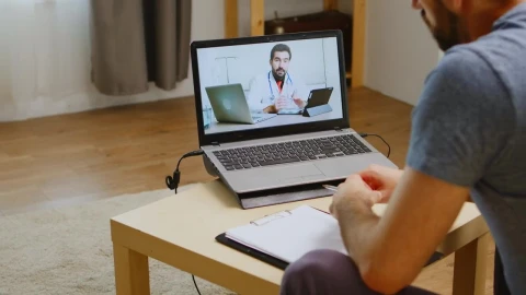 Stock Video Doctor Video Chats With Man During Quarantine Live Wallpaper For PC - Free Live Wallpaper