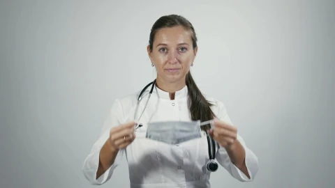 Stock Video Doctor Puts On Medical Mask Live Wallpaper For PC - Free Live Wallpaper