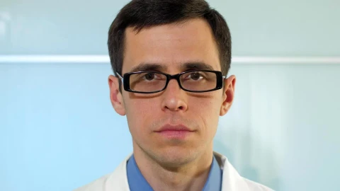 Stock Video Doctor Puts On A Mask In The Hospital Portrait Live Wallpaper For PC - Free Live Wallpaper