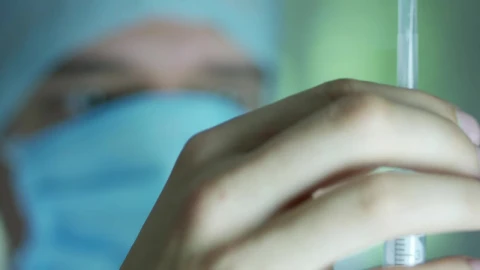 Stock Video Doctor Preparing A Syringe Live Wallpaper For PC - Free Live Wallpaper