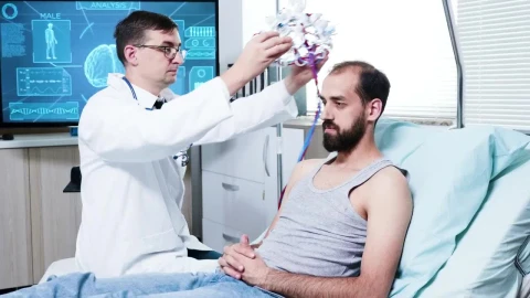 Stock Video Doctor Prepares Patient For Brain Scan In Hospital Live Wallpaper For PC - Free Live Wallpaper