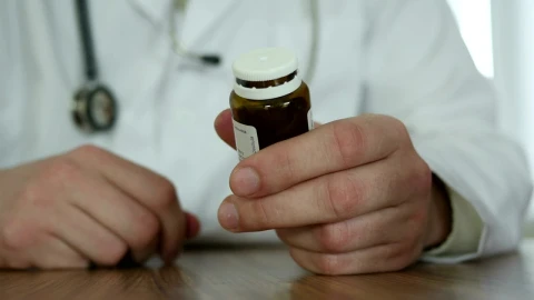 Stock Video Doctor Opening A Pill Bottle Live Wallpaper For PC - Free Live Wallpaper