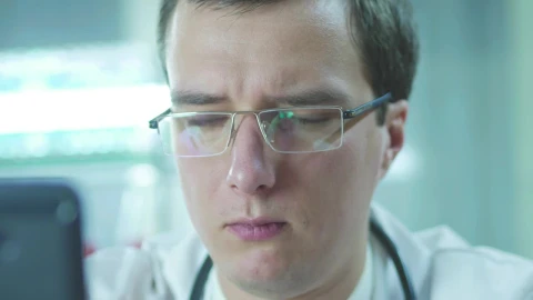 Stock Video Doctor On A Video Call On The Mobile Phone Live Wallpaper For PC - Free Live Wallpaper