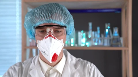Stock Video Doctor Mixing Some Liquids Live Wallpaper For PC - Free Live Wallpaper
