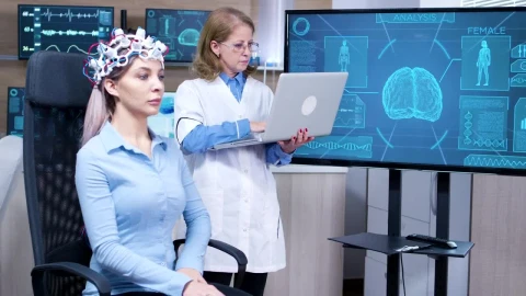 Stock Video Doctor Looks At Patient Brain Scan On Screen Live Wallpaper For PC - Free Live Wallpaper