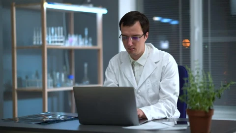 Stock Video Doctor Looking At An X Ray And Working On The Computer Live Wallpaper For PC - Free Live Wallpaper