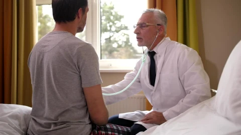 Stock Video Doctor Listening To A Heartbeat At Hospital Live Wallpaper For PC - Free Live Wallpaper