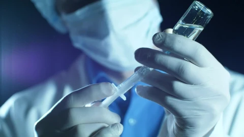 Stock Video Doctor Filling A Syringe With Anesthesia Live Wallpaper For PC - Free Live Wallpaper