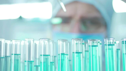 Stock Video Doctor Extracting Liquid From The Lab Tubes Live Wallpaper For PC - Free Live Wallpaper